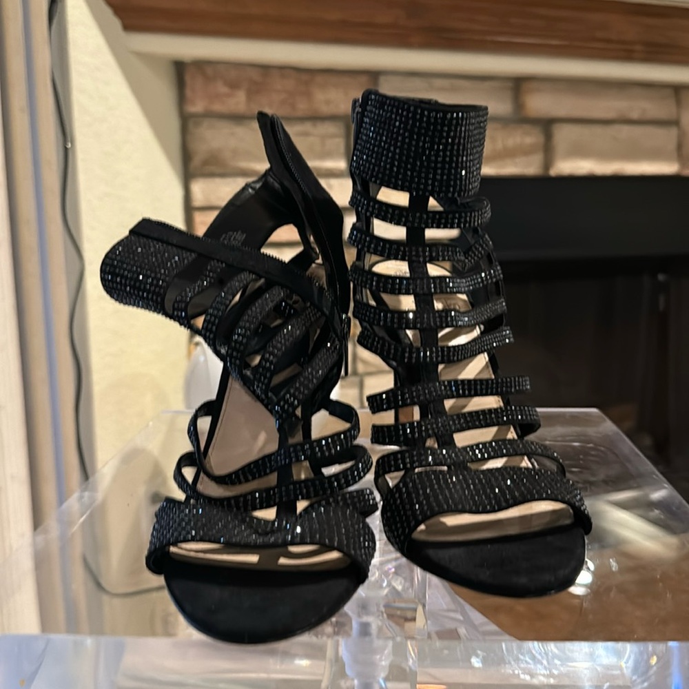 Black zip open toe heels